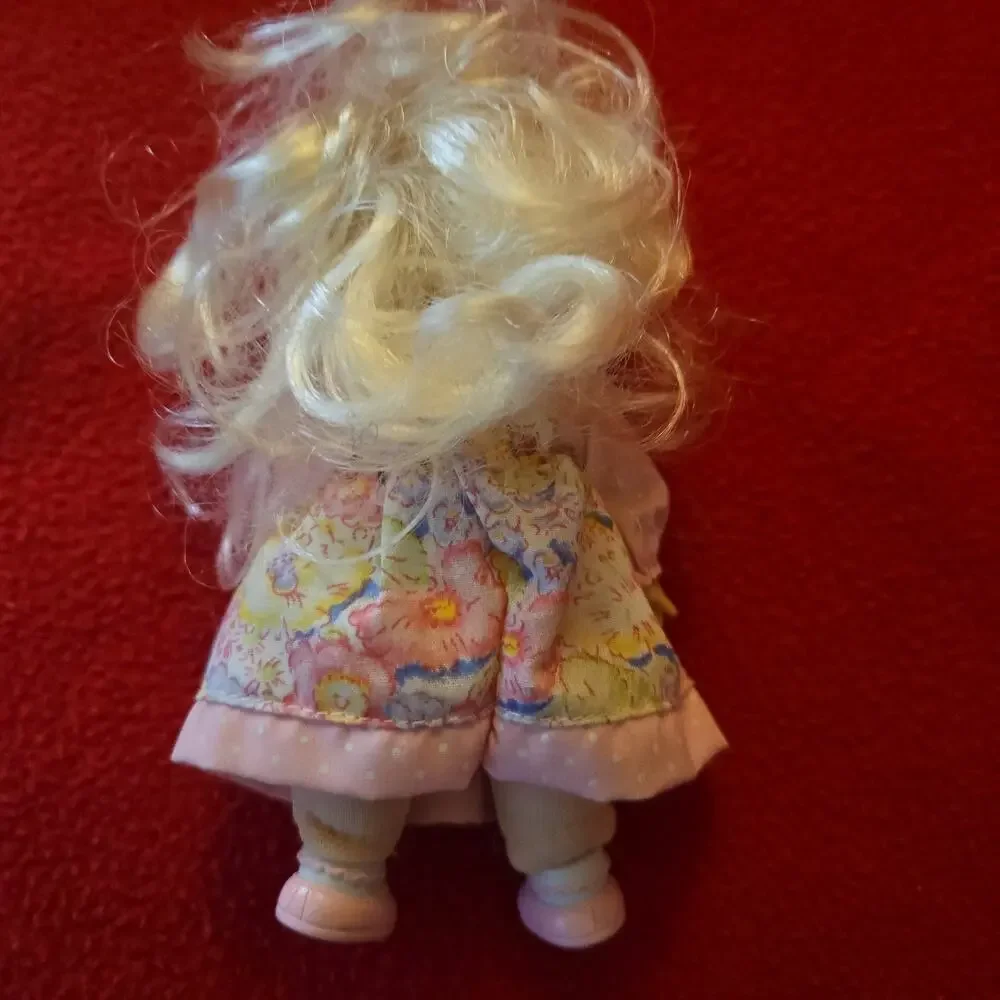 Vintage 2000 Precious Moments 5” doll.